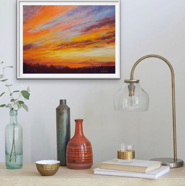 Framed print of blazing orange sunset painting