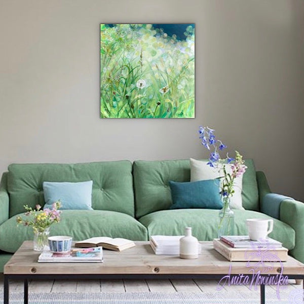 calming small acrylic on canvas painting of green grass meadow in sunlight with dandelion seed heads by Anita Nowinska