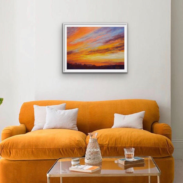 Framed print of blazing orange sunset painting