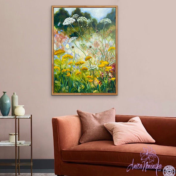 yellow achillea, st annes lace, white cow parsley wild flower painting by anita nowinska in room with burnt orange sofa