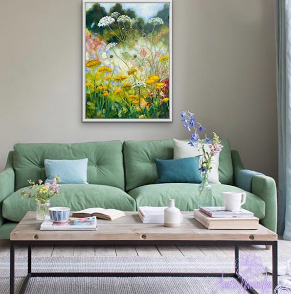 yellow achillea, st annes lace, white cow parsley wild flower painting by anita nowinska in room with green sofa