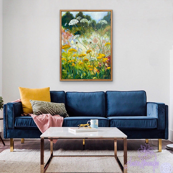 yellow achillea, st annes lace, white cow parsley wild flower painting by anita nowinska in room with navy sofa